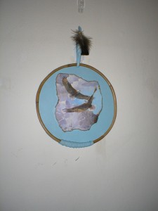 Eagle on sky blue leather